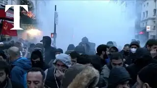 Paris shooting: police fire tear gas at protesters after gunman kills three