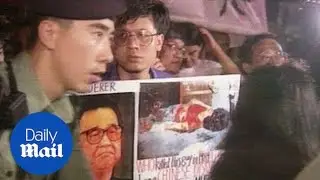 Locals demonstrate as the UK hands Hong Kong over to China - Daily Mail