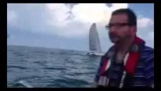 Hunter 260 sailing by a trimaran