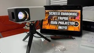 Mini Projector, AKIYO 1080P Supported Portable Projector with Tripod, 55000 Hours Multimedia