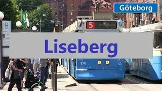 Liseberg i G&ouml;teborg N&ouml;jesf&auml;lt och stadsbild med sp&aring;rvagn.