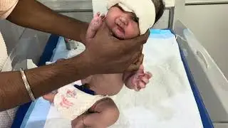 New born baby bottle feeding 