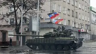 Heavy shelling in eastern Ukraine forces civilians to flee