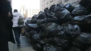Trash piles up on snowbanks in parts of NYC