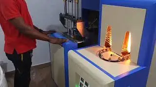 Preforms Blowing Machine for Plastic (PET) Bottle Water Production in a Table Water Factory 