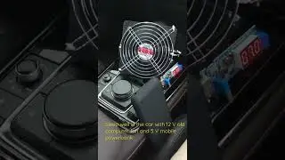 Sleep well in the car with 12 V old desktop fan and mobile phone powerbank boost