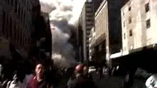 People running in street, Burning building, smoke at end of street