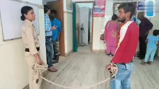 Rapist handcuffed and arrested by Indian female police.