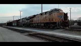 NS 154 AT GREENVILLE LEAD BY A UP C45ACTTE OR ES45AC 7852 DURING CREW CHANGE. (2)