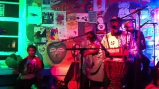 Alessandro Eko on drums with Baba Adesose Wallace and Ras Asheber 2014at SOAS