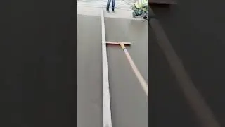 Concrete surface finishing for road construction