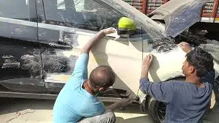 My team member work karte hue movies Tata nexon repairing workshop pic