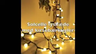 Solcelle lysk&aelig;de med sm&aring; kirseb&aelig;rkugler med fjernbetjening