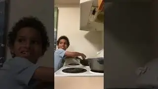 Roman makes chicken and corn ￼