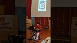Atharva Deshpande playing on keyboard at Maharashtra Mandal Denmark's Diwali 2024 celebration