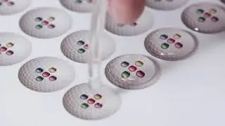 Liquid Lens label resin doming production system.