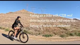 Riding mid drive e-bike with CZJB 500W MOTOR on road!