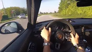 Porsche 991.2 GTS drifting a roundabout