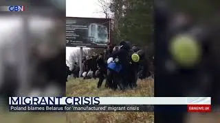 Migrants aided by Belarus try to storm border into Poland