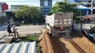 Nice project Support by Dozer Komatsu D20P Truck 5T to pushing & sand drop to Flooded land