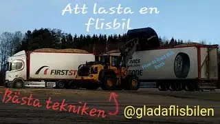 Att lasta en flisbil (Loading a woodchip truck)