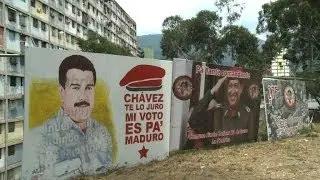 One year after Chavez, Maduro struggles to live up to his memory