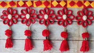 DIY easy woolen and newspaper door hanging - DIY Innovativ Ideas