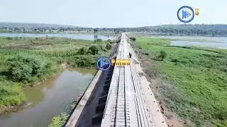 ITAZAME KWA UZURI MANDHARI YA JUU YA MTO UGALA NA DARAJA KUBWA LA KUVUKIA TRENI KWENYE MTO HUO.