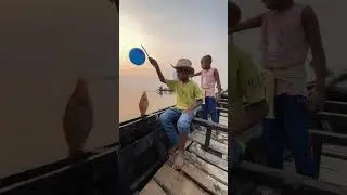 tribal girl & boy hook #fishing from boat