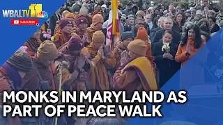 Thousands line up to greet monks in Maryland