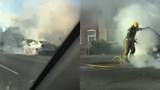 Captivating scene of a man driving past a car ON FIRE!!!