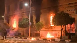 Tripoli municipality building torched on fourth night of protests | AFP