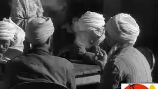 مدينة سيدي عقبة سنة 1957 /السوق الأسبوعية مع تعليق باللغة الفرنسية