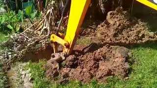 JCB  digging surface for house construction