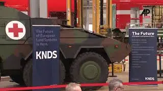 German chancellor faced protests during visit at weapon factory in Saxony