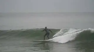 Surfer at Topanga Beach, CA