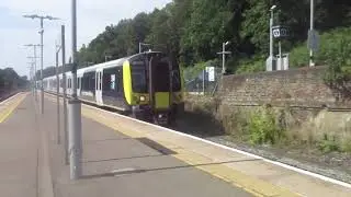 That Is a SWR Train Class 444034 444038 450120 And 450027 In Weybridge