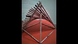 COMO CONSTRUIR UN PARABOLOIDE HIPERBOLICO USANDO PAILLOS DE PAPEL PERIODICO.