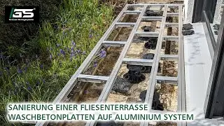 Fliesenterrasse Sanierung - Eine Terrasse mit Waschbetonplatten, Aluminium System und Stelzlager