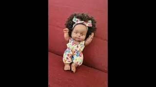 Poup&eacute;e Afro