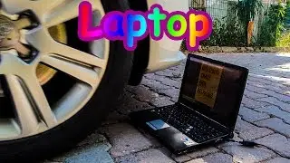 Crushing Laptop Computer Crunchy With Car Tire