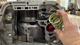 Spacing the Reverse servo spring for faster piston return to disengage low band quicker. Billet drum