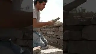 Building a dry stone wall with precision and craftsmanship