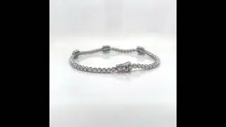18Kt White Gold Diamond and Green Emerald Tennis Bracelet