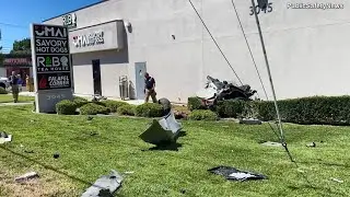 Driver Slams into Pole, Splitting Car in Two and Hitting Building