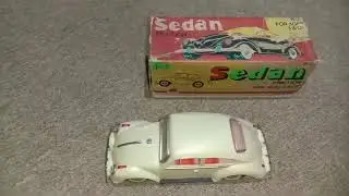 vintage plastic toy Sedan Beetle Volkswagen.Apple made in china 1980s