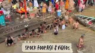 Holy Dip at Varanasi Ghat: Rituals on the Banks of the Ganges |  Stock Footage & Videos