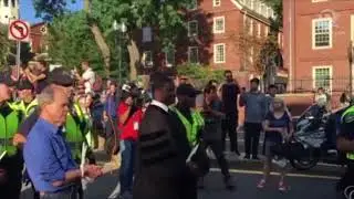Police arrest Harvard, Boston school professors at DACA protests