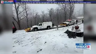Emergency crews work in icy conditions