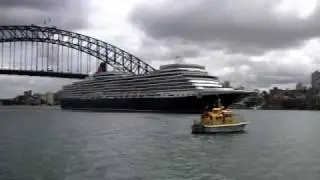 Cunard's Queen Elizabeth blowing its horn on Sydney Harbour